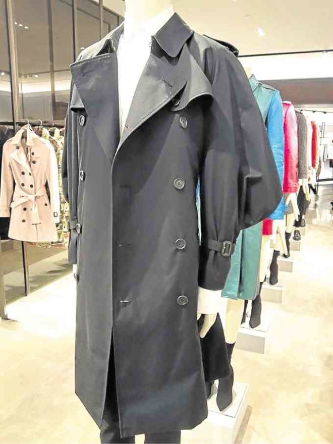Trench with rounded sleeves inspired by sculptures by British artist Henry Moore—RAOUL J. CHEEKEE