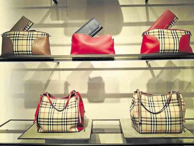 The Burberry check—seen here onwallets, pouches and handbags—is favored by many of the brand’s Asian customers.