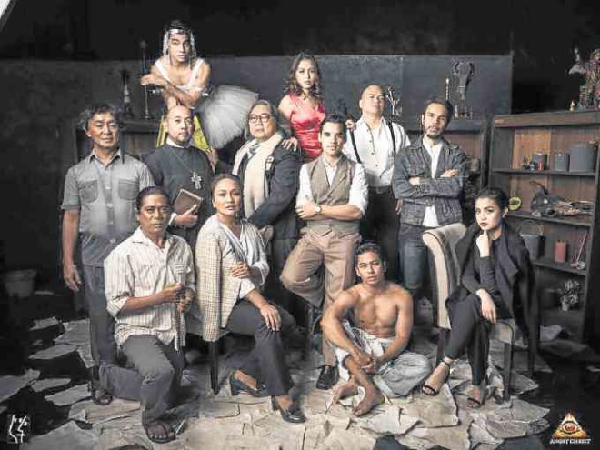 The cast of UP Playwrights’ Theatre’s “Angry Christ,” led by Nelsito Gomez (center, seated) as the young AlfonsoOssorio. Floy Quintos’ play, directed by Dexter M. Santos, runs run April 26- May 14 atWilfrido Ma. Guerrero Theater in UP Diliman. —DULAANG UP