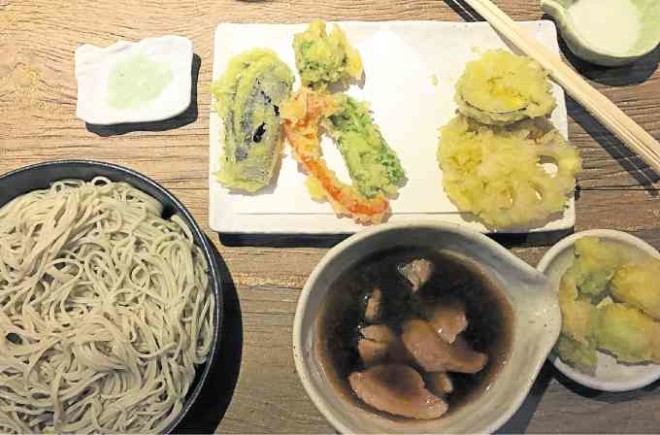 Cold soba with hot duck soup served with duckmeat,mountain yam and green onion tempura