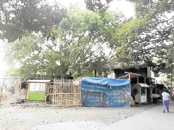 Illegal kiosks sprout at the convent ruins.