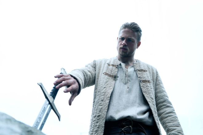 Excalibur only answers to the true born king, King Arthur Pendragon (Charlie Hunnam). / Warner Bros. Pictures
