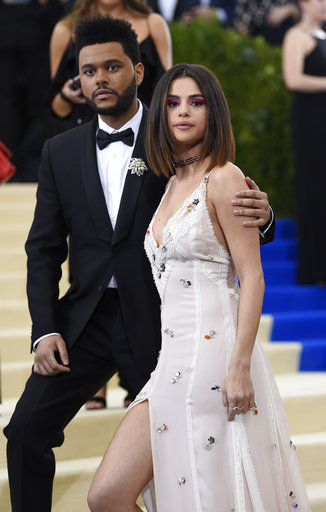 The Weeknd, left, and Selena Gomez attend The Metropolitan Museum of Art's Costume Institute benefit gala celebrating the opening of the Rei Kawakubo/Comme des Garçons: Art of the In-Between exhibition on Monday, May 1, 2017, in New York. (Photo by Evan Agostini/Invision/AP)