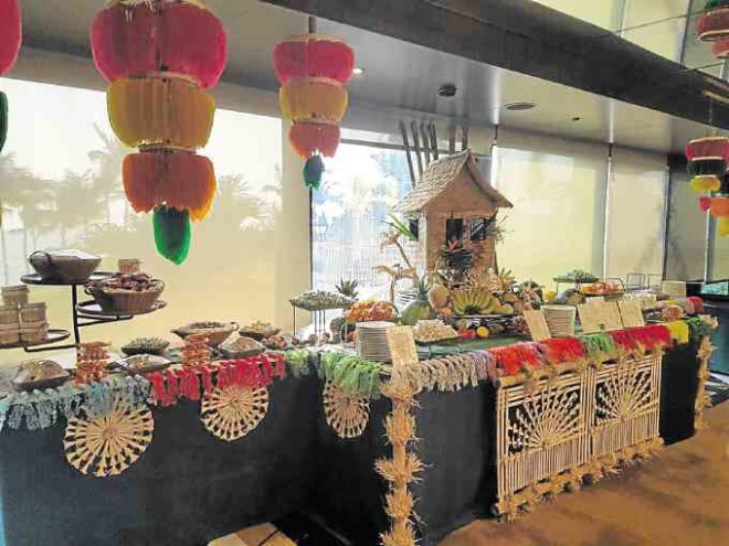 Buffet station carries the Pahiyas theme, with "kiping" from Lucban,Quezon, and "bahay kubo" housing native delicacies.