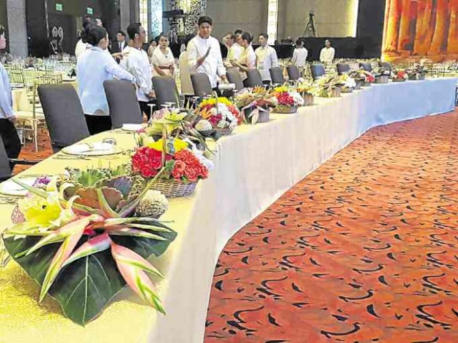 Birds of paradise, balls of sampaguita deck the table of Asean leaders.