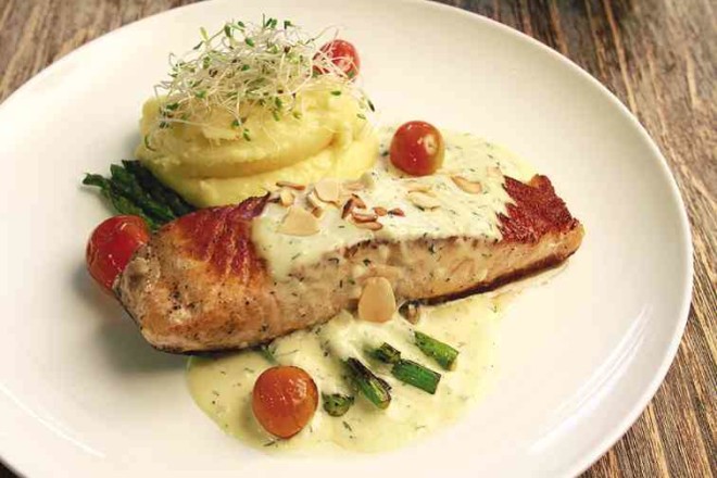 Grilled salmon in almond cream saucewithmashed potatoes