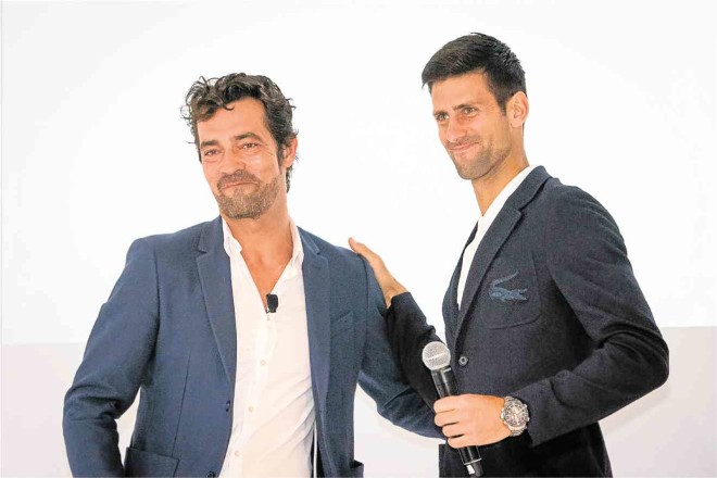Lacoste CEO Thierry Guibert and Novak Djokovic face the media in Monte Carlo. 