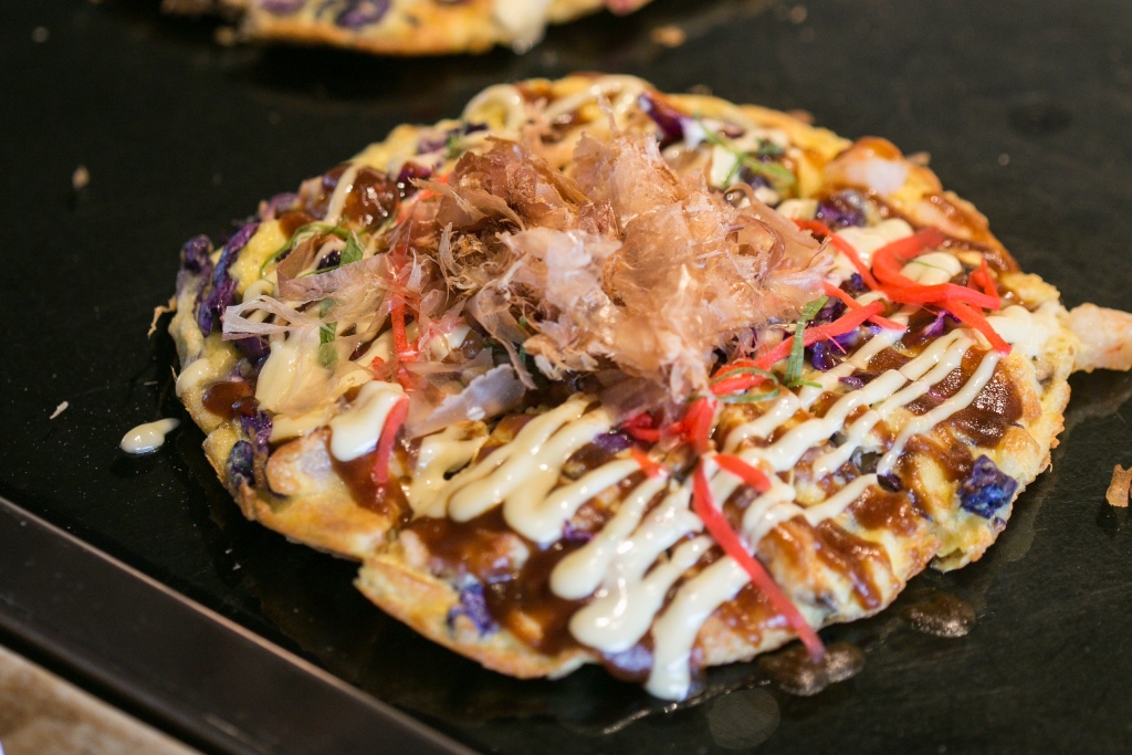 Nobu's okonimyaki (Japanese pancake) served pizza-style