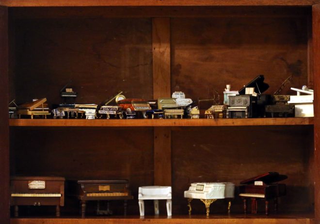 Part of Sunico’s collection of miniature pianos