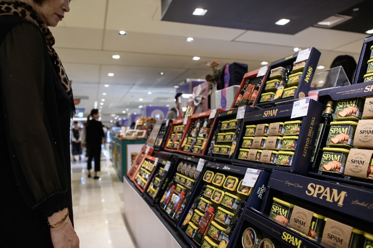 In a photo taken on September 21, 2018 Spam gift boxes are displayed at a supermarket in Seoul. From the front lines of war to a staple of institutional catering, Spam is rarely seen as a gourmet ingredient -- but the canned pink meat holds a unique position in South Korea as a top-selling holiday gift. / AFP PHOTO / Ed JONES / TO GO WITH STORY: SKorea-food-festival-spam, by Hwang Sunghee