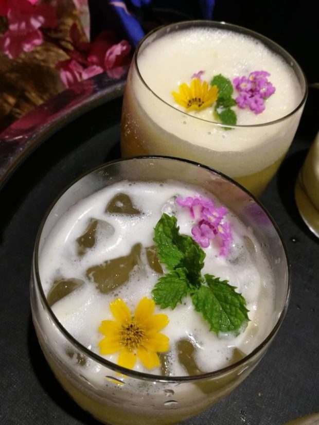 Conrad Manila’s Brasserie on 3: Welcome cocktails topped with edible flowers