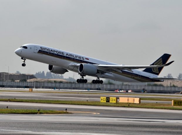 (FILES) flight In this file photo taken on March 28, 2018 a Singapore Airlines (SIA) Airbus A350 aircraft takes off from the Changi Airport in Singapore. - A new Singapore Airlines route connecting the city-state to New York goes into operation on October 11, becoming the longest commercial plane ride in the world. (Photo by Roslan RAHMAN / AFP)