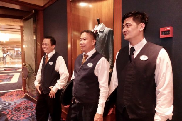 KAILANGAN POSITIVE Restaurant crew (L to R) Larry Legarde, Rodney Pancho, and Joffrey Patingan on the Voyager of the Seas ROYAL CARIBBEAN