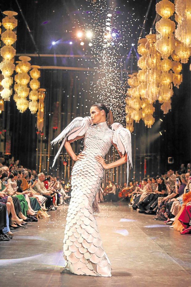 Cary Santiago’s silk gazar terno with sleeves and feathers, inspired by parrots