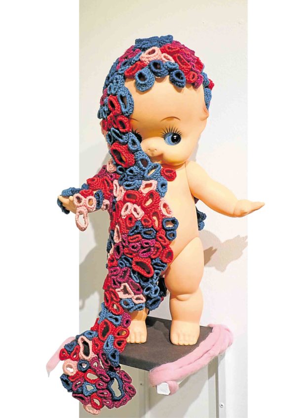 “Covered,” Japanese Kewpie doll with freeform crochet, organic cotton yarn