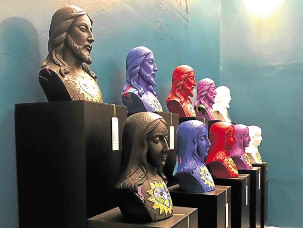 Religious busts in striking colors simulate icons in ancient “retablo” of churches.