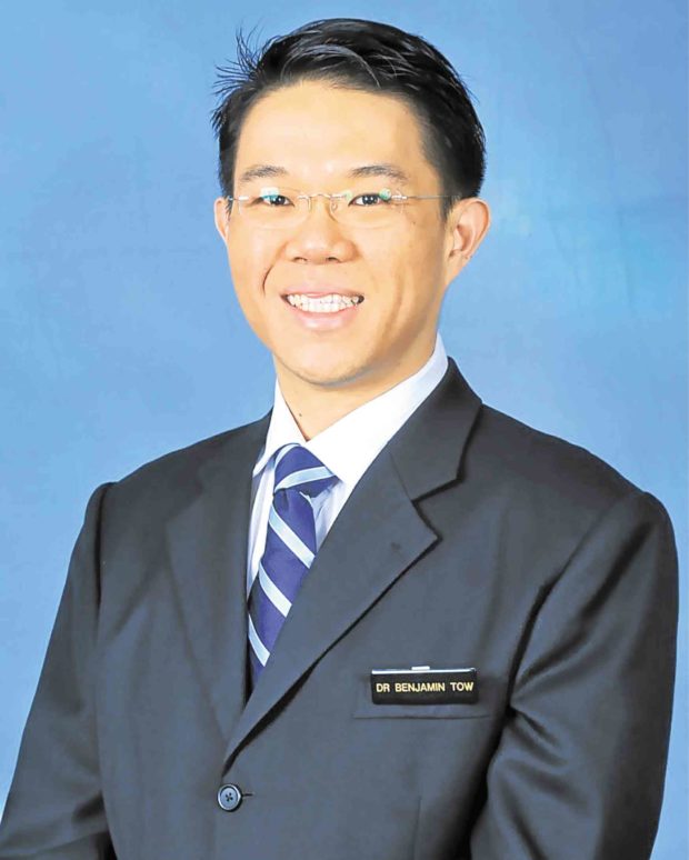 Dr. Benjamin Tow, orthopedic and spine surgeon at Mt. Elizabeth Hospital in Singapore