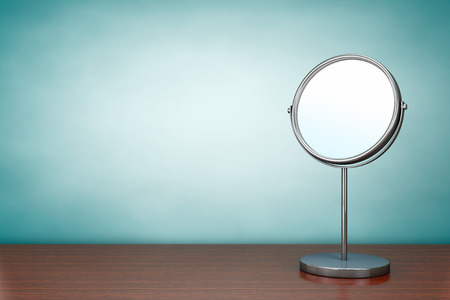 old style photo. chrome makeup mirror on the table