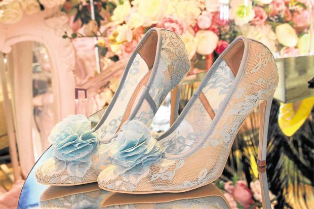 Lace and floral designs on shoes —Photos by Nelson Matawaran