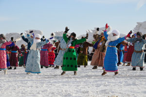 The Inner Mongolia autonomous region's Hulunbuir celebrates the Winter Nadam Festival with performances. [PHOTO BY XU LIN/CHINA DAILY]
