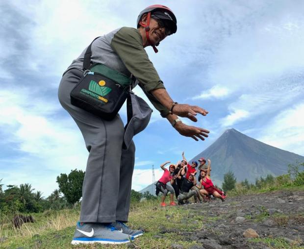Trick shot with Mayon as backdrop