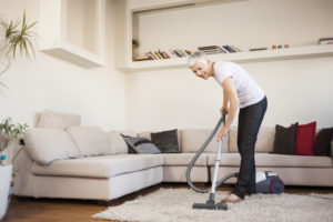 old woman cleaning