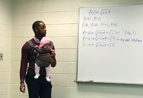 Professor carries student's baby