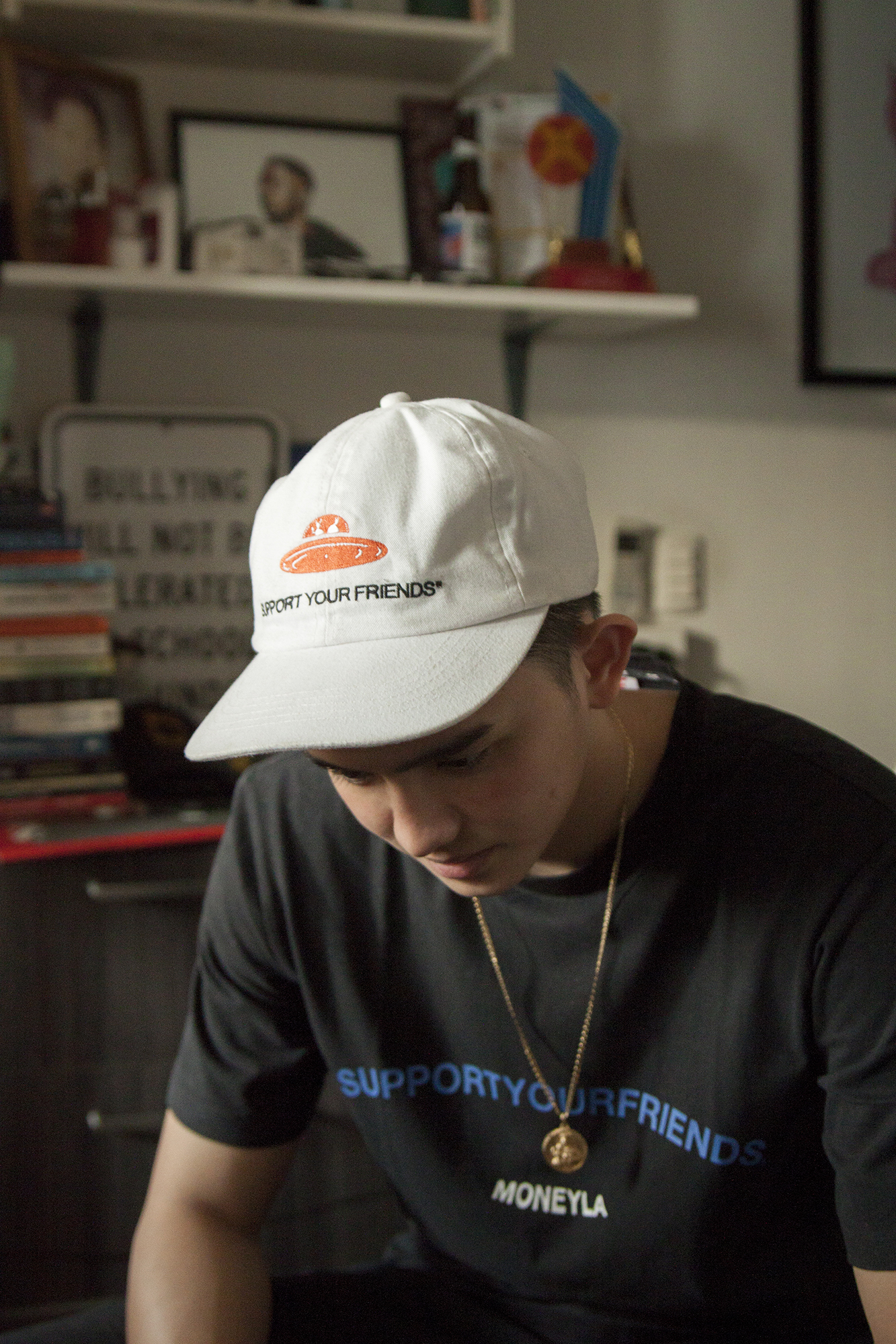 Randell wearing the OG Support Your Friends cap. PHOTO © JED GREGORIO