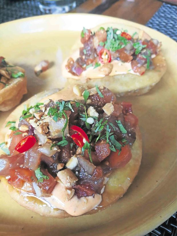 Tuna “tostada” is a play on tastes and textures.