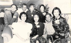 MaridelVillavicencio,Vic Vic’swife (seated left), and his cousin TootsieMarco (right)with TripleVfoundersValentin “Tito” Eduque (second from left, standing) and Violeta Baltazar (right, standing) at one of their all-white parties for Kamayan in the ’80s