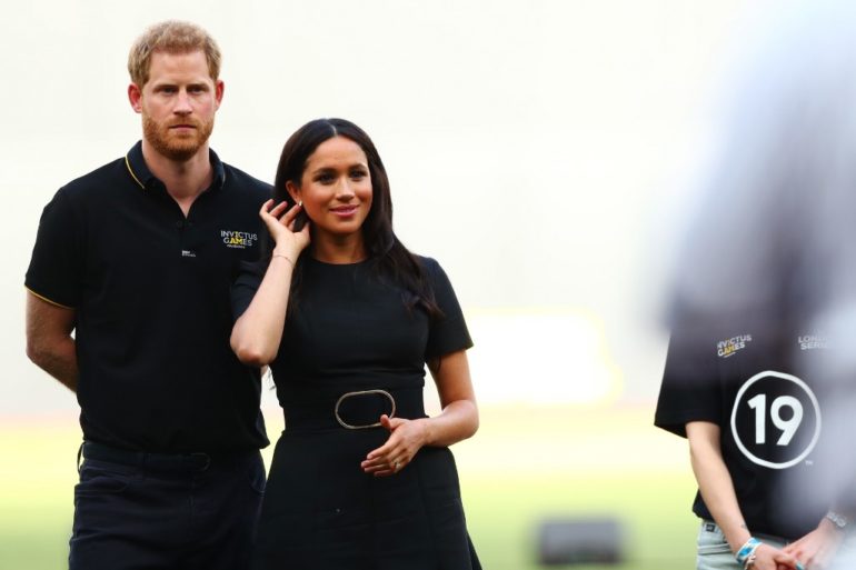 LONDON, ENGLAND - JUNE 29: Prince Harry, Duke of Sussex and Meghan, Duchess of Sussex look on during the pre-game ceremonies before the MLB London Series game between Boston Red Sox and New York Yankees at London Stadium on June 29, 2019 in London, England. Dan Istitene - Pool/Getty Images/AFP