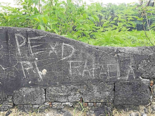 Vandals deface cultural treasure Malagonlong Bridge in Tayabas