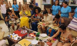 Miss Earth delegates making bags