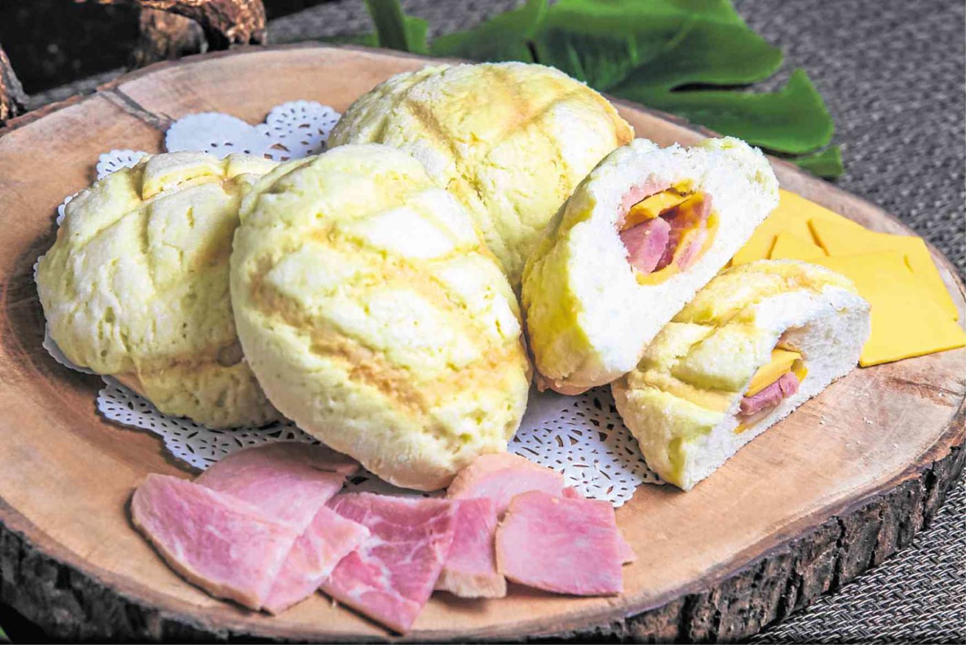 Japanese bread pastry with sweet ham and cheese filling Lifestyle.INQ