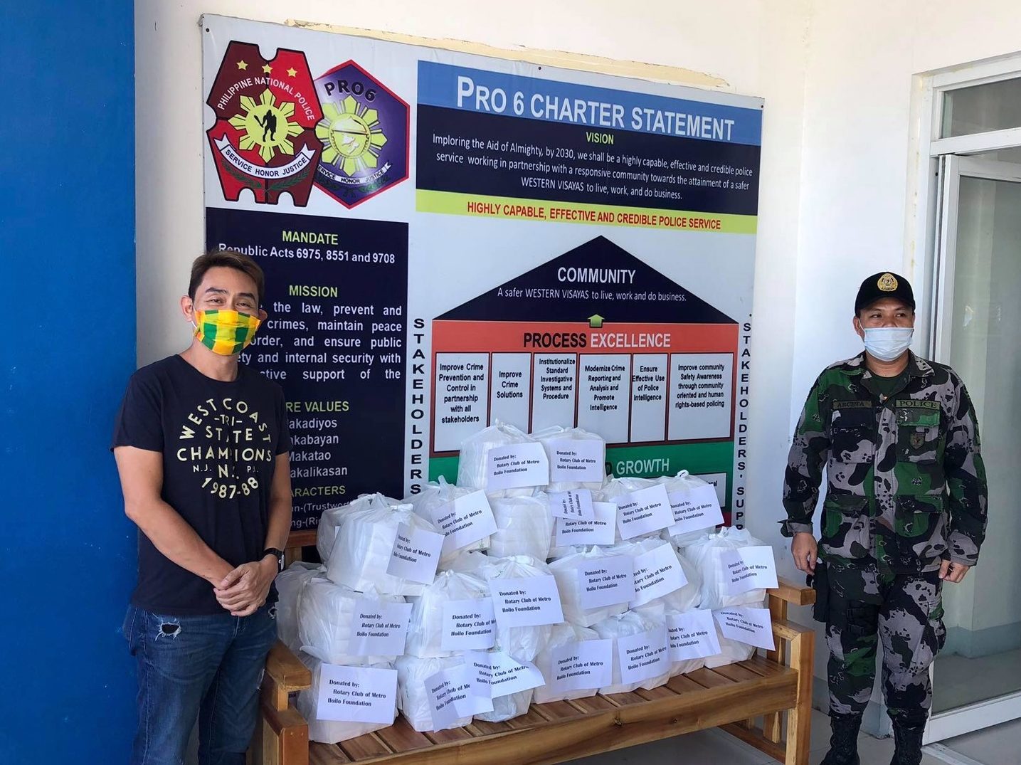 Kevin Piamonte (left), Banusing’s best friend, makes a delivery to the Iloilo City police