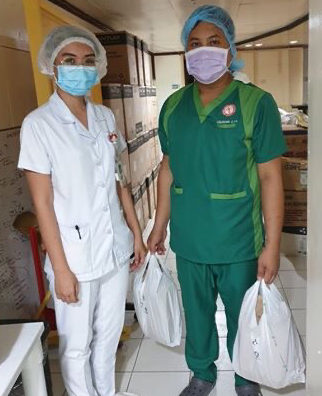 West Visayas Medical Center staff with meals by Banusing