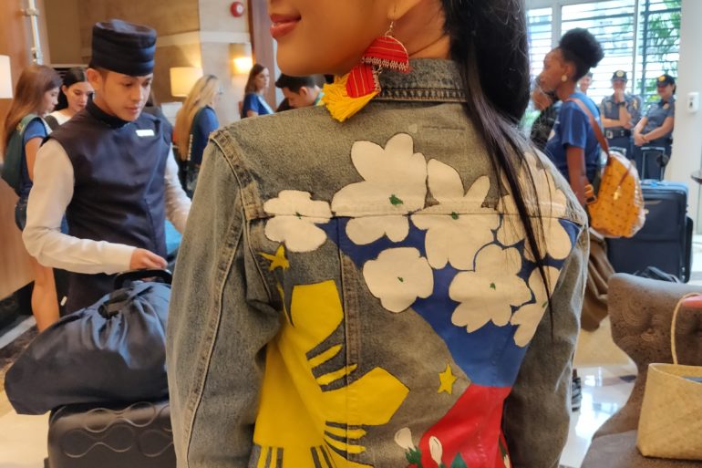 Reigning Miss Philippines Earth Janelle Tee shows off her locally-made jacket adorned with the colors of the Philippine flag, and Sampaguita flower pailettes./ARMIN P. ADINA