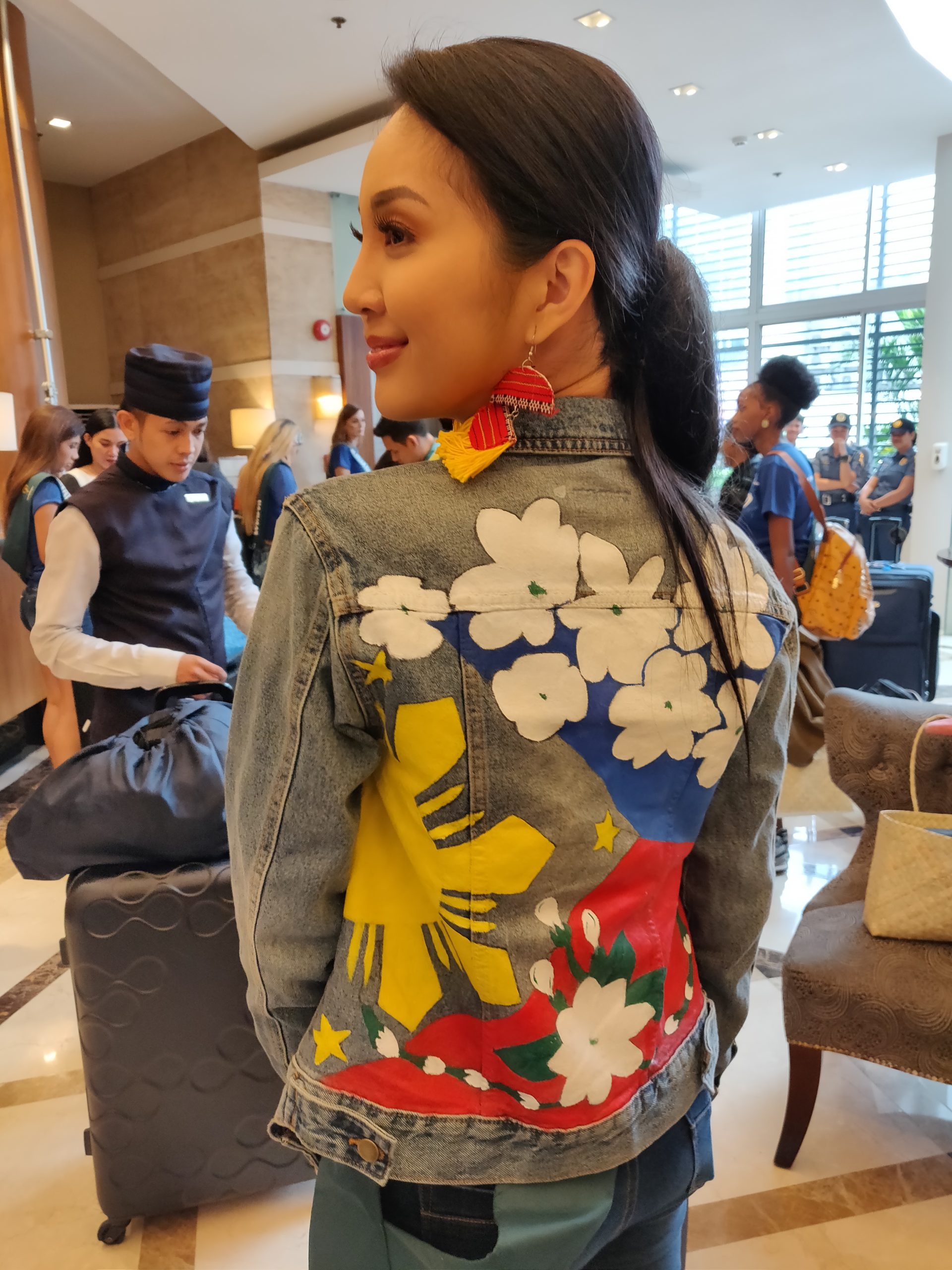 Reigning Miss Philippines Earth Janelle Tee shows off her locally-made jacket adorned with the colors of the Philippine flag, and Sampaguita flower pailettes./ARMIN P. ADINA
