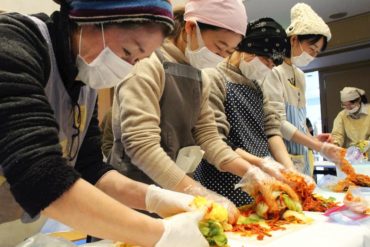 people making kimchi