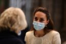 Britain's Catherine, Duchess of Cambridge (R) speaks to health workers as she visits the coronavirus vaccination centre at Westminster Abbey, central London on March 23, 2021, to pay tribute to the efforts of those involved in the Covid-19 vaccine rollout