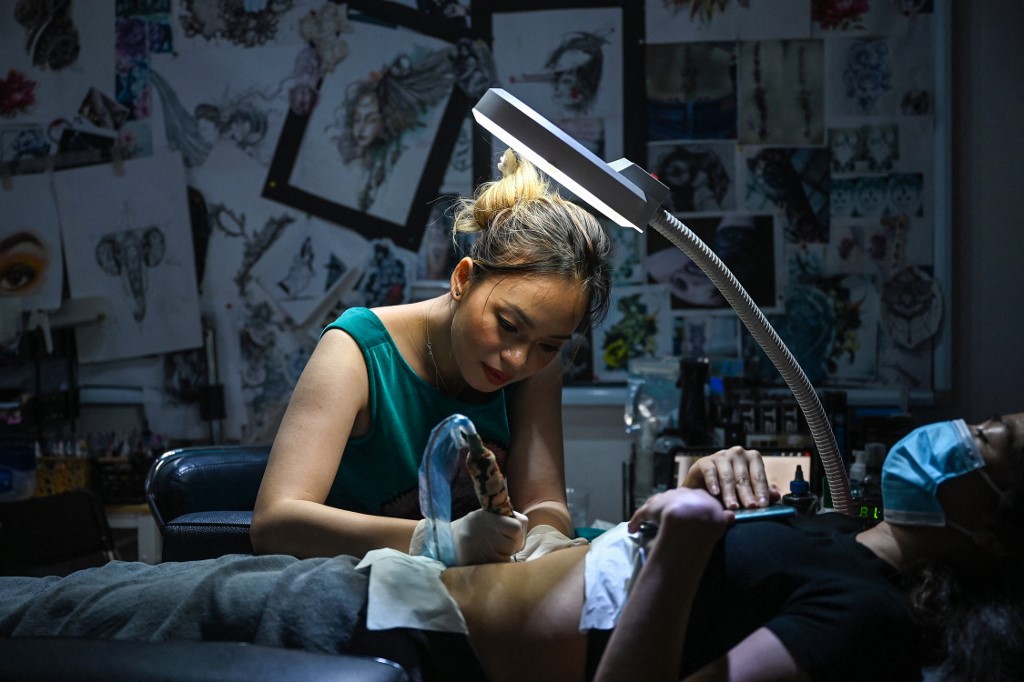 Scar tissue: Vietnamese women find healing with tattoos