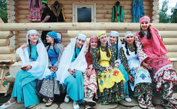 Women in colorful folk costumes gather in Kazan to celebrate Sabantui