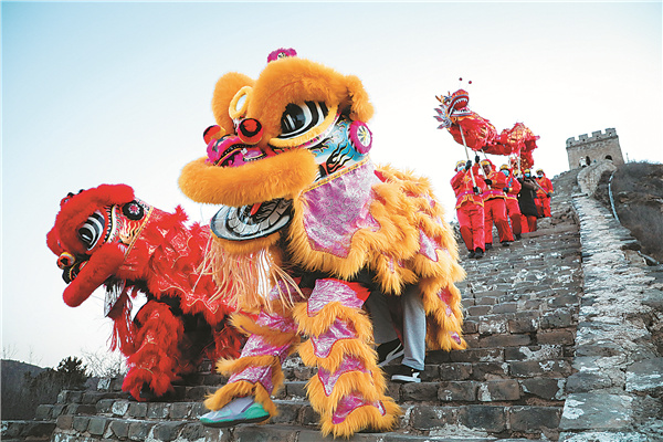 Dragon and lion dancing on the Simatai section of the Great Wall