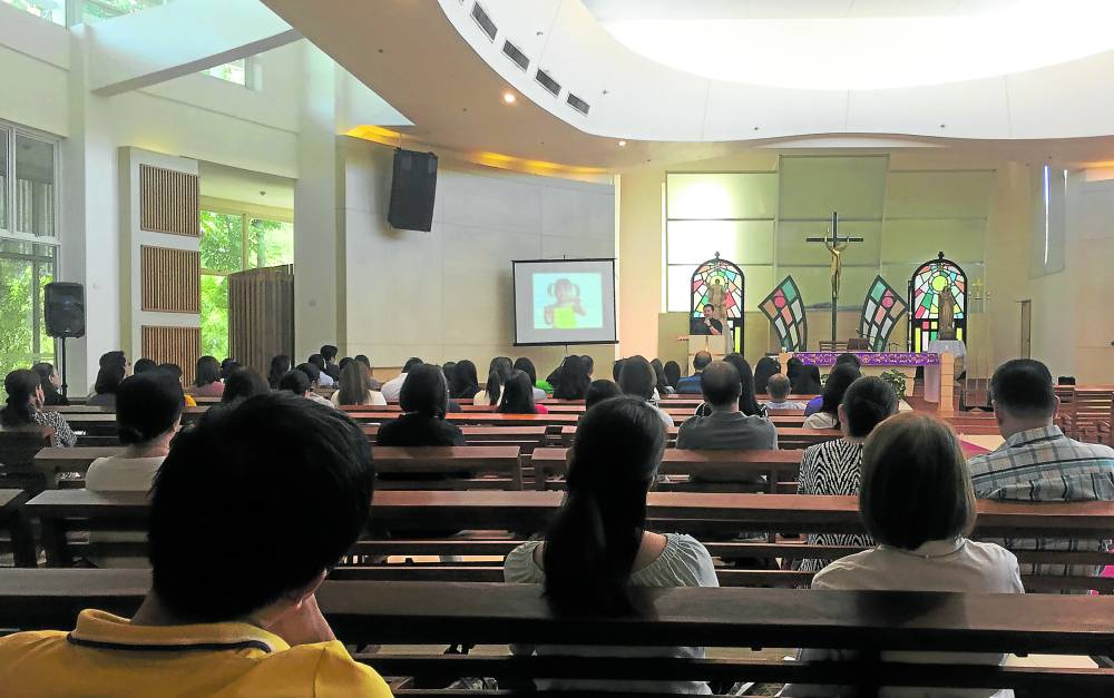 Fr. Ian Gabinete addressing parents at the Our Lady of the Star chapel