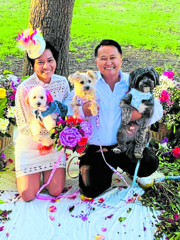 Three dogs and a wedding: The couple with the furry members of their entourage