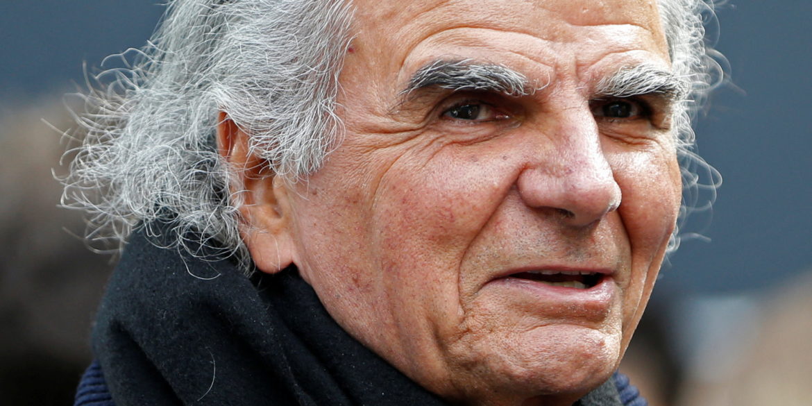 FILE PHOTO: French fashion photographer Patrick Demarchelier attends German designer Karl Lagerfeld's Fall-Winter 2013/2014 women's ready-to-wear fashion show for French fashion house Chanel during Paris fashion week March 5, 2013. REUTERS/Charles Platiau/File Photo