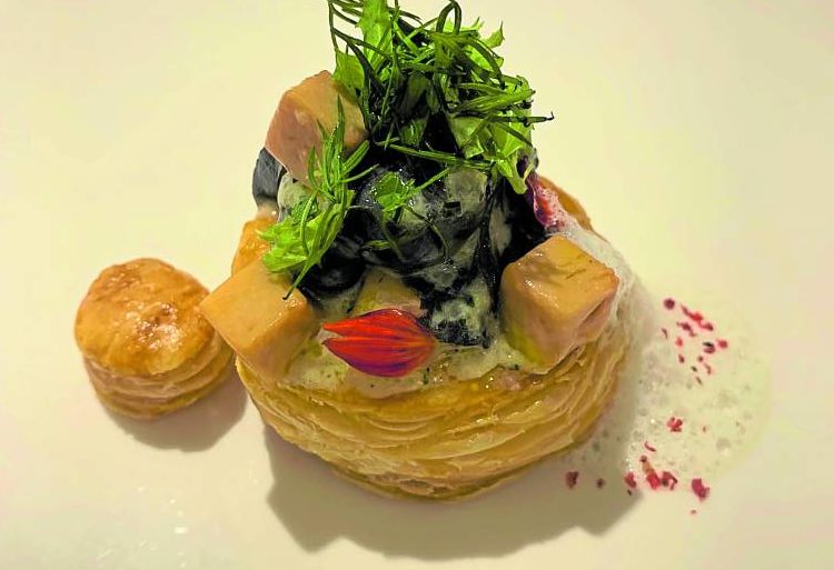 Escargot fricassee vol-au-vent, foie gras “mi-cuit,” Parmesan foam, herb salad