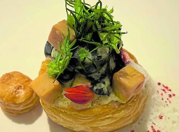 Escargot fricassee vol-au-vent, foie gras “mi-cuit,” Parmesan foam, herb salad