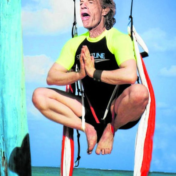Mick Jagger, doing aerial yoga here, also does yoga, Pilates and ballet.