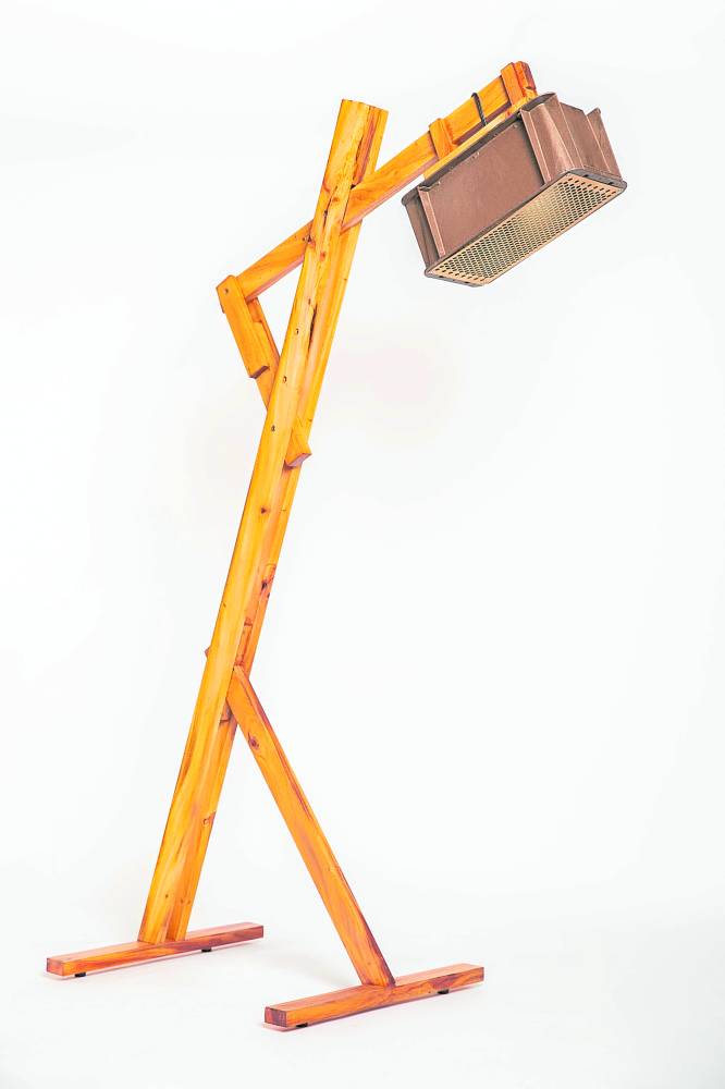 “Contrapunto” floor lamp is a contrast of wood, metal and biocomposite plastic using “bakong.”